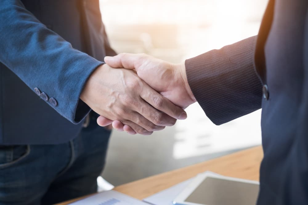 Image capturing a professional handshake.