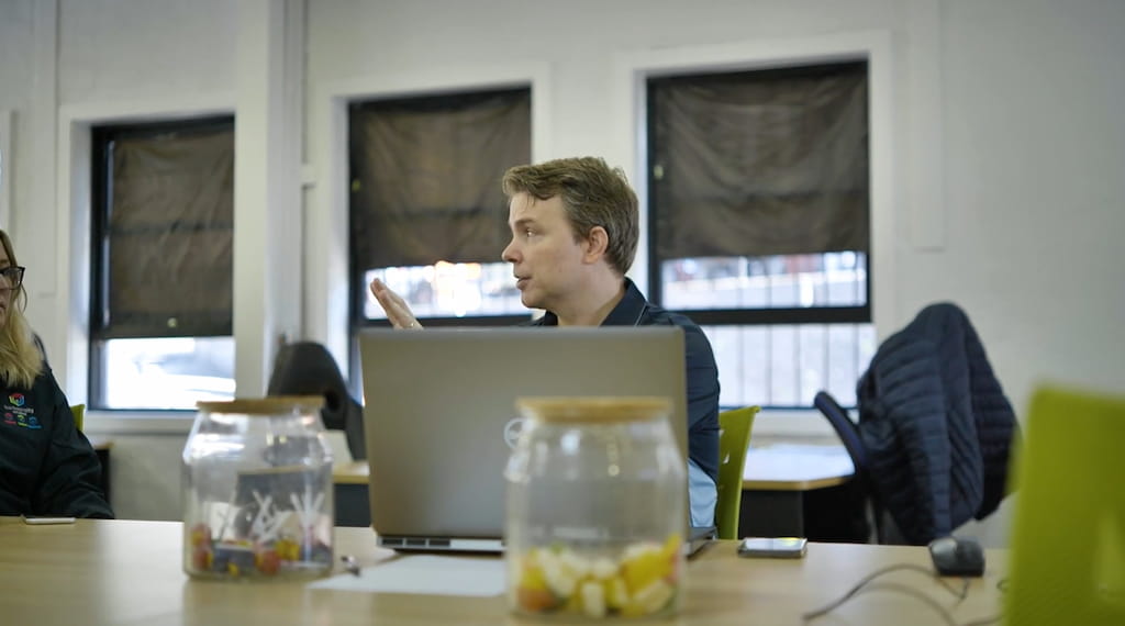 Photo capturing a discussion about Ascora.