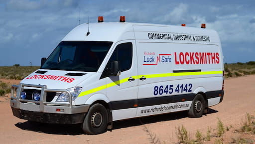 Work van featuring Richard's Lock n Safe logo on the side.