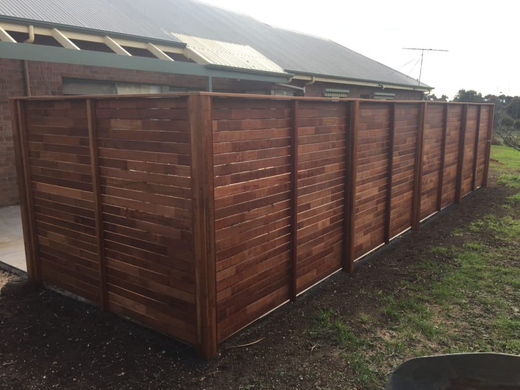 Photo showcasing a well-crafted wooden fence.