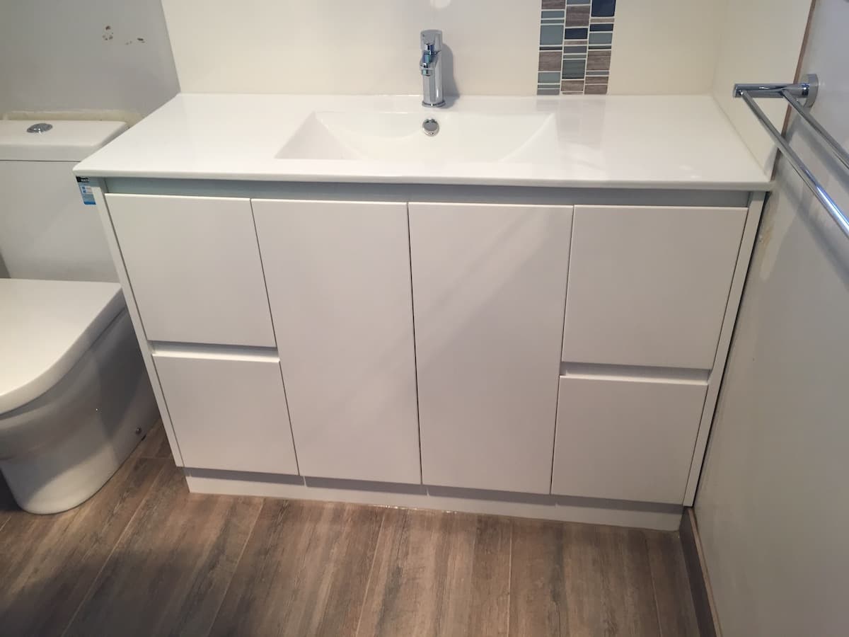 Photo featuring a sleek white sink.